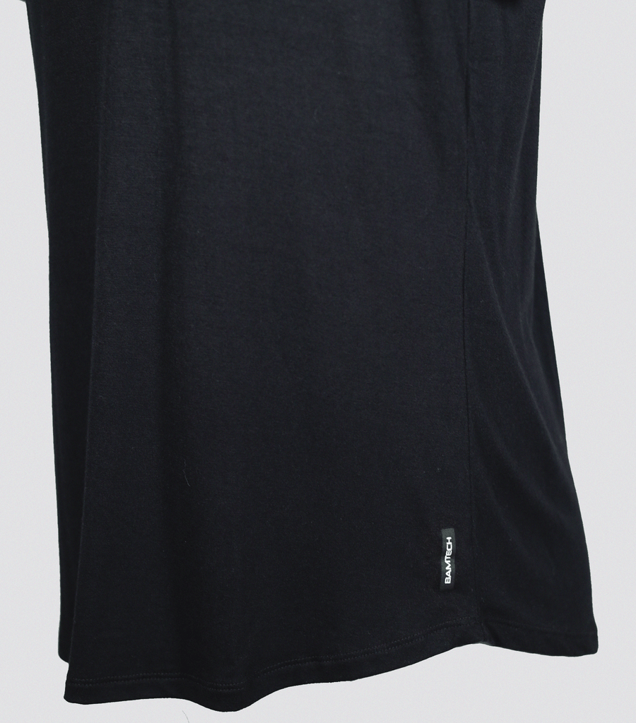 "Black Men's Bamboo Swift Curve Hem Tee - Stylish and Versatile T-Shirt" - Elevate your casual wardrobe with this black men's bamboo swift curve hem tee. The modern curved hemline adds a unique touch to this classic t-shirt, creating a stylish and contemporary look. Crafted from soft and sustainable bamboo fabric, this tee offers a comfortable and breathable fit. Whether you're heading to the gym or meeting friends, this black tee is a versatile and fashionable choice.
