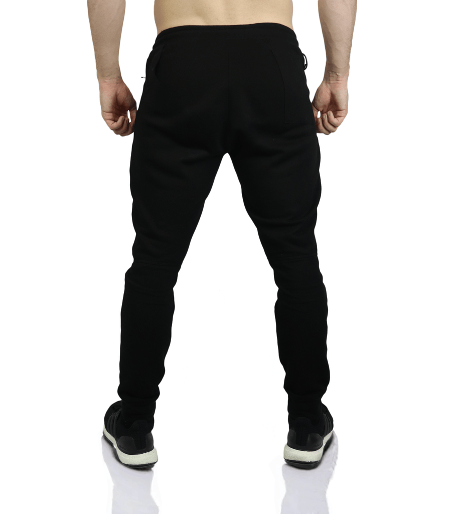 Elevate Your Performance with Bamtech Eucalyptus Performance Jogger - Black: Sustainable Men's Activewear for Superior Comfort and Style. These Joggers are Crafted with Eco-friendly Eucalyptus Fabric, Delivering Unmatched Breathability and Moisture-Wicking Properties. Perfect for Workouts, Running, or Casual Wear, the Eucalyptus Performance Jogger Offers a Modern Fit with Elasticized Waistband and Tapered Legs. Choose Bamtech for Premium Quality and Sustainable Fashion.